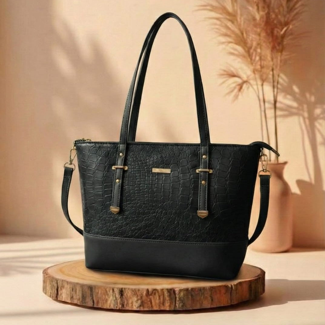 Black handbag on a wooden stand with a neutral background