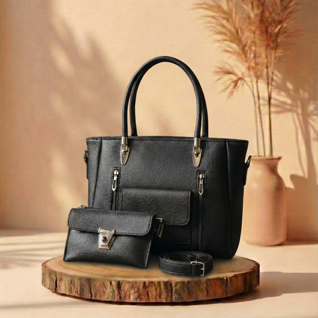Black handbag and matching pouch on a wooden stand with a beige background