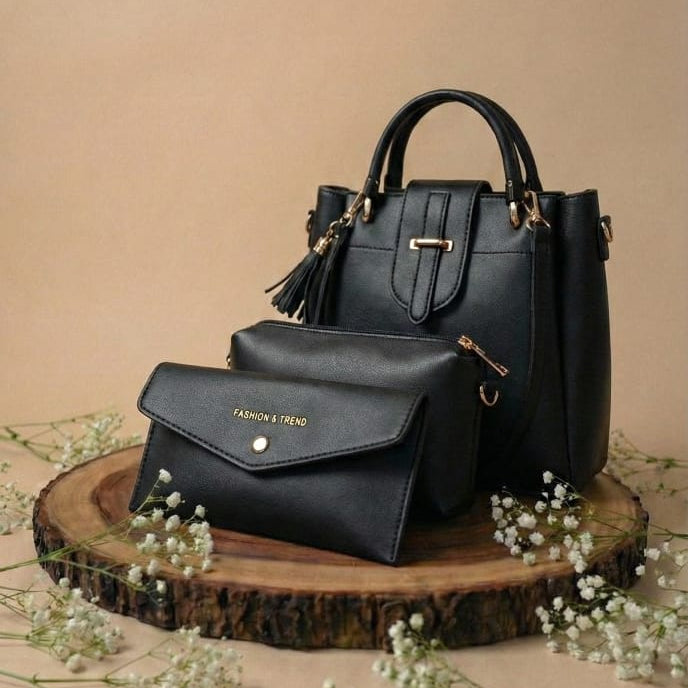 Black handbag on a wooden stand with a beige background