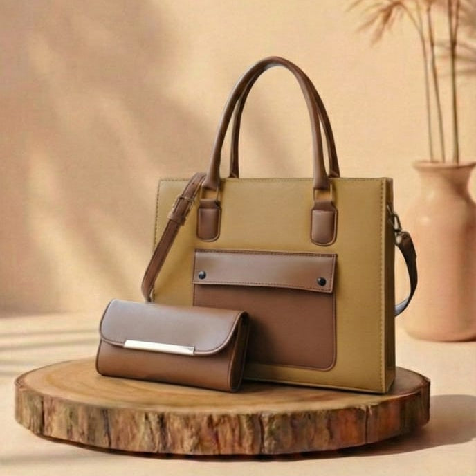 Camel Brown handbag with a matching pouch on a wooden stand against a beige background