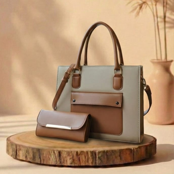 Handbag and matching wallet on a wooden stand with a neutral background